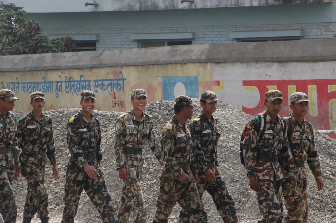 As Nepal prepares for its first election since 2008 military presence on the streets is increasing as tensions rise across the country. One candidate has  already been murdered by a rival in the Terai district and through out Nepal conflict between rival political cadres is increasing. The outcome of the Nov 19 election is uncertain with speculation of country wide bandas ( general strikes) before polling day. Copyright Neesha  ( Alexandra) Bremner 2013